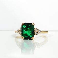 Emerald Ring May Birthstone Gold Ring Gemstone Band Statement Ring Engagement Ring Rectangle Ring Cocktail Ring Prong Ring - Etsy Formal Radiant Cut Ring With May Birthstone, Formal Radiant Cut May Birthstone Ring, Classic Green Emerald Ring With Gemstone Accents, 14k Gold Square Cut Emerald Ring, 14k Gold Emerald Ring Square Cut, Radiant Cut Rings With Center Stone For May Birthstone, Emerald Ring With Prong Setting And Radiant Cut, Green Radiant Cut Rings With Accent Stones, Green Radiant Cut Ring With Accent Stones