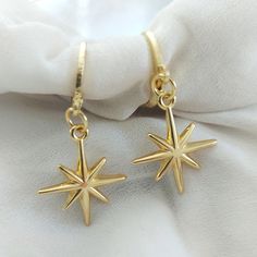 Gold Star Huggie Hoops Perfect gift, stars are universally loved.  A lovely teacher thank you gift of gifts for your bridesmaids. Modern classic small golden hoop huggie earrings.   The earring open with a simple lever. Lightweight simple design, very easy to wear everyday, you won't even feel you're wearing any. Materials Hoops are high quality gold plate over brass with a stainless steel post.  Perfect for sensitive ears.   Jewellery Care To keep your jewellery looking fabulous do not get wet, Star-shaped Single Earring As Gift, Star Shaped Single Earring As Gift, Star Shaped Single Earring For Gift, Celestial Gold Hoop Earrings Gift, Adjustable Star Charm Earrings For Gift, Handmade Star-shaped Hoop Earrings For Gift, Gold Hoop Earrings With Star Charm For Gift, Gold Hoop Earrings With Star Charm As A Gift, Celestial Earrings With Star Charm As Gift