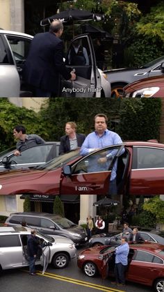 two men standing in front of cars with the doors open and people looking at them