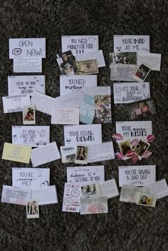 several pieces of paper with pictures and words on them sitting on the floor next to each other