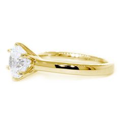 Solitaire Engagement Ring, 6 Prong Crown Setting in 18K Yellow Gold Retail Price: $1,500.00 Online Price: $1,050.00 Sziro Style No.: E/W-Z60208Y Designer: Sziro Jewelry Setting is for a 1CT to 2.5CT round center stone. Setting is 7.5mm wide. Ring is about 2.8mm wide and 2.4mm thick. Center stone diamond is not included. This ring can ship set with a cubic zirconia center stone. https://youtu.be/YdxXIzOtP7k Turtle Charm, Wide Ring, Turtle Pendant, Custom Pendants, Stone Setting, Diamond Solitaire Engagement Ring, Cross Charms, How To Make Earrings, Gold Filled Chain