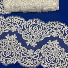 Experience a level of couture luxury that was once only reserved for royalty with our exquisite Corded Double Sided Lace Trimming Embroidered on 100% Polyester Net Mesh. This elegant trimmings is delicately crafted with handmade embroidery, creating an air of sophistication perfect for any special occasion. Perfect to pair with a bridal gown or dance costume, or use as an extra layer of embellishment to a gorgeous evening dress or quinceanera gown. With styles ranging from classic to modern and Elegant Embroidered White Lace, Cream Embroidered Lace For Ceremony, Elegant Cream Lace With Intricate Embroidery, Ceremony Embroidered Cream Lace, Elegant Cream Lace Embroidered Fabric, Elegant Cream Embroidered Lace Fabric, Elegant White Lace With Pearl Embroidery, White Lace For Formal Occasions, White Lace With Lace Work For Formal Occasions