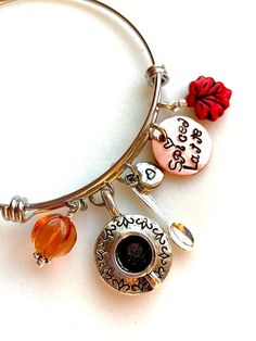 Tradtional favorite spiced coffee bangle with 3D coffee cup and spoon charms, Czech glass pumpkin and fall leaf. Charms are lead and nickel free.  Adjustable bangle bracelet is 2 1/2" diameter high quality stainless steel made in USA.  Hand stamped solid copper charm "Spiced Latte" adds cute accent! Fun fall tradition!! 3d Coffee Cup, Coffee Bracelet, 3d Coffee, Spice Coffee, Adjustable Bangle Bracelet, Pumpkin Latte, Spiced Coffee, Hippie Bracelets, Holiday Coffee