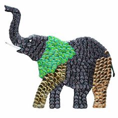 an elephant is made out of different colored circles and has it's trunk curled up