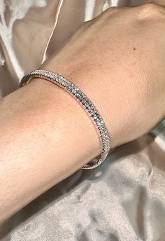 2.00 Carat Natural Diamond Flexible Bracelet G SI 14K White Gold 7''100% Natural Diamonds, Not Enhanced in any way Round Cut Flexible Diamond Bracelet 2.00CTG-H SI 14K White Gold, pave style, 11.1 grams7 inches in length, 1/8 inch in width106 stones B5873-2WALL OUR ITEMS ARE AVAILABLE TO BE ORDERED IN 14K WHITE, ROSE OR YELLOW GOLD UPON REQUEST. All Chains of Pendants and Necklaces Can be Requested in 16'' or 18'' Length. . This item is proudly handcrafted in the USA. Perfect gift on any occasio Flexible Bracelet, Diamond Jewelry Store, Best Diamond, Diamond Bracelets, Diamond Shape, Color 2, White Rose, Diamond Shapes, Jewelry Stores