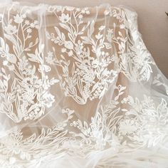 1 Yard Wedding Lace Tulle Embroidery Floral Off-White Drape Lace Fabric for Bridal Gown Dress Train Wedding Veils * Width is about 140cm , price is for one yard, more buying will be cut as one piece . * Gorgeous for wedding gown, haute coutures design, or lace veils , flower girl clothes my shop link: http://www.etsy.com/shop/lacetime ------------------------------------------------------ ---------------------------------------------------------------- ------------------------------------------- Wedding Gown With Floral Embroidery And Tulle Material, Floral Embroidered Tulle Gown For Wedding, Floral Applique Organza Gown For Wedding, Organza Wedding Gown With Floral Embroidery, Wedding Gown With Floral Embroidery In Organza, Wedding Organza Gown With Floral Embroidery, Organza Gown With Floral Applique For Wedding, Floral Embroidered Organza Wedding Dress, Embroidered Organza Wedding Dress