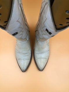 "White men's cowboy boots, made from real leather, vintage style, embroidered with unique pattern, western style, fashionable streetstyle boots, cowboy boots, white color, has size 9 Description: - Sharp socks - Embroidered decorative stitching in beige colors - The original embroidery on boots - On the both sides there are unique pattern - Leather inside and outside - No zippers and buckles - Delicate genuine vintage leather - Tabs on both sides of the boot shaft - Cowboy heel Condition: - Qual White Leather Boots For Western-themed Events, White Ankle Boots For Ranch, Western Cream Boots For Ranch, White Western Boots For Western-themed Events, White Snip Toe Boots For Ranch, Western Cream Ankle Boots, Western Style Cream Ankle Boots, White Leather Western Boots, White Pointed Toe Boots For Western-themed Events