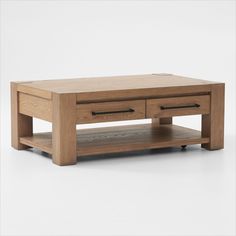 a wooden coffee table with two drawers on each side and one drawer at the top