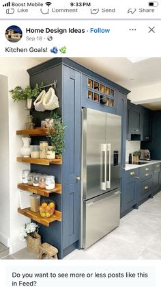 the kitchen has blue cabinets and shelving with shelves on each side that are filled with items