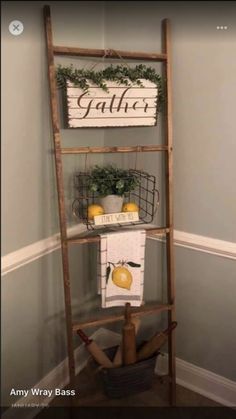 an old ladder is used as a towel rack