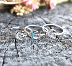 "Opal Moon & Star Ring: -Solid .925 sterling silver -Face height 8mm on 2mm width ring band -Color choice Pink or blue opal with 5 point star, or white opal with North star. -Comfortable and easily stackable! -Available in US sizes 3-13 with half sizes.  More rings here: https://www.etsy.com/shop/AWildViolet?ref=seller-platform-mcnav&section_id=13958646 Looking for a last minute or unique Christmas gift? Visit our \"READY TO SHIP\" section here, ships out in one business day https://www.etsy.com Celestial Style Opal Ring, Adjustable Celestial Star-shaped Rings, Nickel-free Celestial Moon Ring, Celestial Moon Phase Crystal Ring, Adjustable Moon Shaped Celestial Rings, Adjustable Moon-shaped Celestial Rings, Silver Sterling Silver Moon Shaped Opal Ring, Silver Sterling Silver Moon-shaped Opal Ring, Silver Moon-shaped Sterling Silver Opal Ring