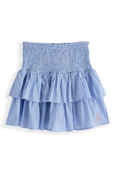 Take a walk on the preppy side with our Seersucker Ruffle Skirt. This tier ruffled mini with built in shorts is made from our classic seersucker chambray print, paired perfectly for your next social beach event. XS-XL sizes Fabric Content: Skirt - 100% Cotton Shorts 100% Rayon Care instructions: Machine wash cold. Tumble dry low. SSW23027 Love Shack Fancy Skirts, Summer Skirted Skort With Ruffles, Ruffled Skirted Skort For Summer, Cute Tiered Skirt Shorts With Ruffles, Spring Cotton Skort With Ruffles, Cotton Ruffle Mini Skirt, Tiered Ruffle Skort For Summer, Cotton Skort For Spring And Summer, Cotton Mini Skirt With Ruffles