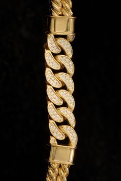 Unlock a new level of bold sophistication with our Cuban Links Twined Bangle. Crafted with passion, this stunning piece exudes elegance and style. Elevate your look with the timeless charm of solid silver Solid Gold Bracelet, Divine Design, Cuban Link, Bracelet Sizes, Black Diamond, White Diamond