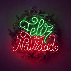 a neon sign that says elliz navidad