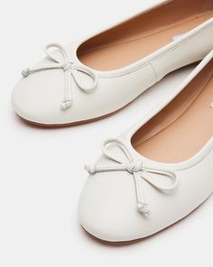 Elevate your shoe collection with the VIXEN ballet flats. With a charming bow detail at the front and a rounded toe, these flats offer a classic and feminine touch to any outfit. These comfortable flats provide both style and durability. Perfect for adding a chic and versatile staple to your wardrobe. .25 inch heel height Leather upper material Synthetic lining Synthetic sock Synthetic sole Imported White Ballerina Flats, White Ballet Flats, White Flat Shoes, Feminine Shoes, Cute Flats, White Flat, Womens Ballet Flats, Comfortable Flats, Leather Ballet Flats