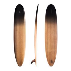 the surfboard is made out of wood and has two long tails on each end