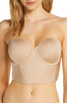 Create a flawless foundation with this smooth longline bra supported by hidden underwires, boning and molded cups. Transform it from strapless into a classic over-the-shoulder style, a halter, racerback or one-shoulder silhouette with the convertible straps. Removable, adjustable straps 76% nylon, 24% elastane Hand wash, dry flat Imported Lingerie Underwire Tube Top With Built-in Bra For Night Out, Elegant Push-up Corset With Built-in Bra, Elegant Tube Top With Built-in Underwire Bra, Strapless Sculpting Shapewear With Medium Bust Support, Bandeau Corset With Removable Bra Pads, Seamless Sculpting Strapless Shapewear, Elegant Stretch Bra Friendly Tube Top, Elegant Stretch Tube Top, Bra-friendly, Strapless Padded Corset