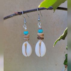 Cute Tropical, Summer, Beach Earrings. Excellent As A Unique Gift For Friends, Sister Wife, Mother, Daughter, Teacher Or Any Lady In Your Life! These Artisan-Made Earrings Perfectly Hang 1.5 Inches. Lightweight And Super Comfortable To Everyday Wear! Details: Materials: Cowrie Shell, Coconut Wood Beads, Turquoise Stone Beads And Surgical Grade Stainless Steel Hook Earrings (Hypoallergenic) All Jewelry Components Are Lead And Nickel Free. Handmade Items. If You Have Any Question Please Feel Free Beach Inspired Jewelry Diy, Diy Cowrie Shell Earrings, Earrings With Shells, Diy Beach Jewelry Ideas, Bohemian Dangle Earrings For Beach, Nickel-free Bohemian Earrings For Vacation, Bohemian Nickel Free Earrings For Vacation, Bohemian Nickel-free Earrings For Vacation, Bohemian Earrings With Ear Wire For Vacation