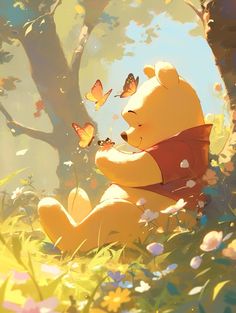 a winnie the pooh bear sitting under a tree with butterflies flying around him and looking at it