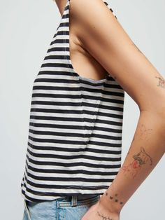 Featuring a classic crewneck, effortlessly draped fit, and a semi cropped length (for an effortless French tuck), it's the easiest muscle tee in your rotation. Trust us. (This one comes in black and white City Stripe.) | Women's Collins Tank Top in City Stripe | Ethical Essentials Chic Crew Neck Cropped T-shirt For Summer, Effortless Crew Neck Spring Top, Effortless Crew Neck Top For Spring, Chic Cotton Crew Neck Muscle Tee, Fitted Muscle Tee For Spring, Fitted Casual Muscle Tee For Spring, Fitted Muscle Tee For Everyday Spring Wear, Effortless Tops With Shirttail Hem, Effortless Top With Shirttail Hem