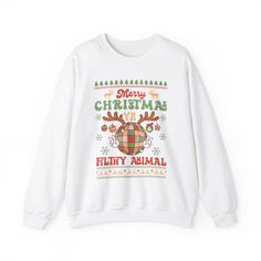 Get into the festive spirit with this Merry Christmas Ya Filthy Animal Home Alone Christmas Sweatshirt. Perfect for cozying up by the fire or attending holiday gatherings, this sweatshirt exudes a fun and casual vibe. Ideal for fans of the classic Christmas movie 'Home Alone' and anyone looking to add a touch of humor to their holiday wardrobe. Product features - Unisex heavy blend sweatshirt made with a cozy fabric blend of 50% cotton and 50% polyester - Ribbed knit collar with seam for elasticity and shape retention - Ethically made with 100% US-grown cotton and OEKO-TEX-certified dyes - Classic fit with double-needle stitching for durability - Tubular knit design reduces fabric waste and enhances the garment's appearance Care instructions - Machine wash: cold (max 30C or 90F) - Non-chlo Cozy Winter Holiday Sweatshirt, Christmas Cotton Long Sleeve Sweater, Holiday Cotton Sweater With Long Sleeves, Holiday Long Sleeve Cotton Sweater, Long Sleeve Cotton Sweater For Holiday, Festive Holiday Cotton Sweater, Winter Holiday Long Sleeve T-shirt, Christmas Long Sleeve Sweater With Letter Print, Christmas Sweater With Letter Print And Long Sleeves