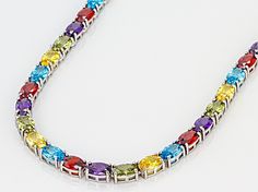 Bella Luce ® multicolor gemstone simulants 52.05ctw oval, rhodium over sterling silver necklace. Measures approximately 18"L x 0.13"W and has a hidden box closure. Fine Jewelry Multicolor Oval Gemstones, Multicolor Multi-stone Oval Necklaces, Oval Multicolor Multi-stone Necklaces, Multicolor Multi-stone Oval Necklace, Multicolor Oval Multi-stone Necklace, Multicolor Oval Necklace With Gemstone Accents, Multicolor Oval Stone Jewelry, Multicolor Oval Necklaces With Gemstone Accents, Oval Multicolor Necklaces With Gemstone Accents