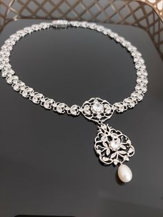 Elegant Bridal Pendant Necklace With Jewels, Elegant Bridal Choker Necklace, Exquisite Wedding Necklace With Clavicle Chain, Elegant Bridal Choker With Clavicle Chain, Victorian Silver Necklace With Historical Design, Elegant Bridal Necklace For Anniversary, Ornate Formal Jewelry Choker, Ornate Formal Choker Jewelry, Elegant Formal Choker Necklace