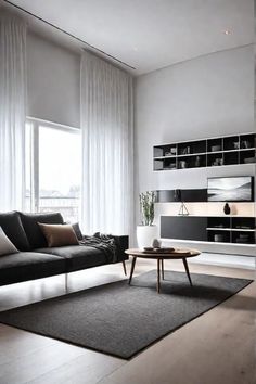 a living room filled with furniture and a large window next to a wall mounted tv