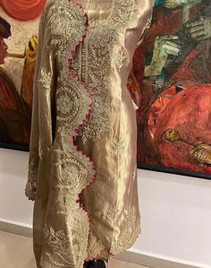 Item Overview ATHARVA Hand Woven Pure Tissue Silk Salwar Kameez/Aari Dori Embroidery/Gold Tissue/Heirloom Worthy/Custom Stitch Unstitch/Wedding/Plazzo/Gift/ Designer Wear Dno. SK2007 Fabric:  * Shirt: Pure Tissue Silk - Hand Embroidery/ 2.5 Mts Beautiful Aari Dori Work * Dupatta: Pure Tissue Silk - Hand Embroidery/ 2.5 Mts Beautiful Aari Dori Work/Elegant/Tassels/ * Bottom: Pure Tissue Silk 2.5 Mts. Excusive Hand Embroidered Party Wear Punjabi Suit. Customization: * Fabrics Customization: Designs Can be made in different Fabrics. *Color Customization: Designs Can be made in different Colors *Stitching Customization: 1. Salwar Kameez  2. Patiala Salwar Kameez  3. Churridar  4. Tunic Pants  5. Anarkali (Extra Charge) 6. Maxie (Extra Charge) 7. Plazzo Pants 8. Embroidered Pants or Salwars 9. Luxury Katan Silk Salwar Kameez With Dori Work, Transitional Tissue Silk Kurta With Zari Work, Festive Kurta With Resham Embroidery On Tissue Silk, Tissue Silk Straight Kurta For Reception, Straight Tissue Silk Kurta For Reception, Embroidered Straight Kurta In Tissue Silk, Festive Tissue Silk Kurta With Zari Work, Embroidered Tissue Silk Straight Kurta, Traditional Wear Tissue Silk Straight Kurta For Reception