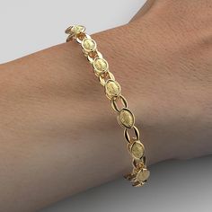 Discover our exquisite Italian Gold Bracelet, a true masterpiece of craftsmanship and elegance. Crafted in your choice of 14k or 18k solid gold, this Baroque Style Link Bracelet is a radiant symbol of luxury and style. • 14k or 18k Gold • The Bracelet is available in standard 7.5 inch length (18,5 cm). • Made in Italy Heirloom 14k Gold Round Bracelets, Heirloom 14k Gold Bracelets, Heirloom 14k Gold Round Bracelet, Elegant Gold Diamond Bracelet Luxury Style, Gold Luxury Diamond Bracelet With Elegant Design, Elegant Gold Diamond Bracelet In Luxury Style, Gold Diamond Bracelet With Elegant Design, Gold Diamond Bracelet With Elegant Design For Formal Occasions, Elegant Yellow Gold Bracelet With Elegant Design