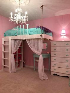 a bedroom with pink walls and a white bunk bed covered in curtains next to a dresser