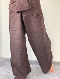 "Unisex Thai fisherman pants. One size fits all. You can wear in many occasions, casual wear, yoga wear, relax at home, travel etc. If you are looking for some pants that you can wear everywhere, comfortable, relax and Easy to wear. Thai fisherman pants is Answer!! Nice gift for yourself or your lover One pocket on the side for storing your items such as wallets, mobile phones, etc Approx. Measurements: One size can fits most and 1 Pockets Waist around 51\" (Wrap Pants) Length 45\" Lower Leg 14\ Thai Fisherman Pants, Genie Pants, Fisherman Pants, Wrap Pants, Unisex Pants, Boho Pants, Rayon Pants, Lower Leg, Pants Wide Leg