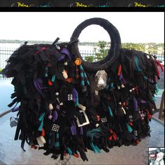 "Black Fringe Purse,short fringe Bag,Rhinestones,Jewels,Beaded bag,upcycled,funky handbag,one of a kind,custom made Bursting with Color. These handmade unique one of a kind upcycled fabric fringe Handbag/Bags/Purse/Totes are handmade by re-purposing strips of fabric, so no two Bags will ever be the same. Because of the nature of how they are made if you are ordering a solid color Bag, the colors will not all be the same shade but will be very close. When ordering a custom multi colored upcycled Fringe Handbags Purses, Funky Handbags, Diy Denim Skirt, Funky Purses, Fringe Handbags, Custom Handbags, Everyday Handbag, Tiny Puppies, Fringe Purse