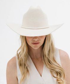 From coffee dates to country music festivals, the Teddy has you covered. With a true Cattleman crown + wide Western brim this classic, Western hat is sure to stand out in a crowd. Make this style your own by adding one of our custom had bands Off White Material - 100% Australian Wool White Western Panama Hat With Curved Brim, White Fitted Country Straw Hat, White Fitted Country Style Straw Hat, Fitted Panama Hat For Western-themed Events, White Western Felt Hat For Kentucky Derby, White Panama Hat For Western-themed Events, Fitted White Panama Hat For Rodeo, White Rigid Hat For Ranch, Fitted Brimmed Hat For Rodeo