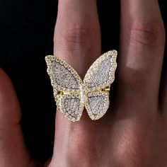 Introducing the Iced Butterfly Star Ring in 18k Gold Vermeil. This exclusive ring is a showstopper, featuring an iced out butterfly flooded in hand-set stones with our signature stars displayed on the side. Wear it anytime, anywhere- this piece is guaranteed to shine! This product is guaranteed for life – GLD will repair or replace the item should you experience any defects in craftsmanship or breakage. Don't know your ring size? Review our sizing chart below to find your best fit. Specification Butterfly-shaped Yellow Gold Jewelry With Diamond Accents, Butterfly Shaped Yellow Gold Diamond Jewelry, Yellow Gold Butterfly Diamond Jewelry, Yellow Gold Butterfly Shaped Jewelry With Cubic Zirconia, Yellow Gold Cubic Zirconia Butterfly Jewelry, Fine Jewelry Butterfly Pendant With Diamond Accents, Fine Jewelry With Butterfly Diamond Accents, Fine Jewelry Butterfly With Diamond Accents, Iced Out Diamond Ring Fine Jewelry For Gift