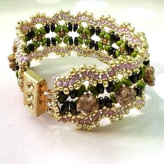 "Special and elegant pink, gold, and green bracelet. This unique bracelet is perfect for formal wear, casual wear, evening dress, or whatever you like. It is also perfect as a gift for yourself or someone you care about. The cuff bracelet is beaded with Czech and Miyuki beads. The closure is by a box clasp. ♦ 𝗔𝗱𝗱 𝘀𝗼𝗺𝗲 𝗺𝗼𝗱𝗲𝗿𝗻 𝗹𝗼𝗼𝗸 𝘁𝗼 𝘆𝗼𝘂𝗿 𝗼𝘂𝘁𝗳𝗶𝘁 𝘄𝗶𝘁𝗵 𝘁𝗵𝗶𝘀 𝗵𝗮𝗻𝗱𝗺𝗮𝗱𝗲 bracelet ♦ ♦ 𝗧𝗵𝗼𝘂𝗴𝗵𝘁𝗳𝘂𝗹𝗹𝘆 𝗽𝗮𝗰𝗸𝗮𝗴𝗲𝗱 𝗶𝗻 𝗮 𝗴𝗶𝗳𝘁 𝗯𝗼𝘅 ♦ ♦ 𝗠𝗘𝗔 Unique Gold Beaded Cuff Bracelet, Elegant Gold Beaded Bracelets With Colorful Beads, Elegant Gold Beaded Bracelet With Colorful Beads, Green Beaded Jubilee Bracelet, Elegant Multicolor Beaded Bangle Bracelet, Elegant Green Jewelry With Bracelet Strap, Elegant Beaded Bracelets With Unique Variations, Elegant Beaded Bracelet With Unique Variations, Elegant Pink Beaded Bracelets With Gold Beads