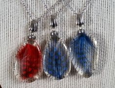 *Resin *Stainless steel  Chain length can be customized at checkout, message me if you desire a longer or shorter length. Resin guinea feather necklace, The red teardrop is 3/4" wide x 1-1/2" long, and has an 18" stainless steel chain and clasp.  Blue feather is sold out. The last 4 photos show genuine snake skin necklaces, real skelton leaf and mushroom resin necklaces available in my shop. ENTER MY ETSY SHOP HERE GildedLilley.Etsy.com Feather Resin, Mushroom Resin, Resin Necklaces, Beachy Jewelry, Resin Pendant Necklace, Feather Necklace, Blue Feather, Feather Necklaces, Resin Necklace