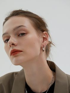 With their well-polished, sleek design, these minimalist earrings are a perfect blend of elegance and edge. They offer a contemporary twist on a timeless look, featuring a unique irregular c-shape that creates movement and complements any outfit, day or night. Diameter: approx. 2 cmFinish: 18 Karat Gold over 925 Sterling Silver Modern Metal Jewelry For Work, Modern Jewelry With Polished Finish For Workwear, Chic Silver Wrap Earrings, Elegant Metal Jewelry For Work, Chic Silver Jewelry For Workwear, Chic Silver Jewelry For Work, Modern Hoop Earrings For Formal Occasions, Elegant Metal Wrap Earrings For Everyday, Elegant Everyday Metal Wrap Earrings