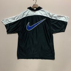 [DESCRIPTION] Please read the description first before buy my items‼️‼️ Vintage 90s Nike Spell Out Big Logo Zipper Ups Jersey Tee Size on tag : M Tag says M,fits like L All in good condition [MATERIAL] Polyester  [MEASUREMENT] Measurement:  armpit to armpit : 23.5 inches  Back collar to bottom : 27.5 inches [CONDITION] - All in good condition  - No hole no rip no stain [PAYMENT & NOTICE] - We accept PayPal ONLY - No return/refund - All items will be post over shipping company counter within 1-3 working days after payment completed and please allow 1-3 weeks for shipping delivery to your destination. -We are trusted seller. Do message me if you have any questions to ask about this item. ❌ATTENTION❌ 💥Do not rely on tag size as pre-worn item may have been altered,stretched or shrunk & vintag Pull Nike 90s, Nike Athletic Vintage Sweatshirt, Vintage Nike Tees, Cheap 90s Style Sports T-shirt, Affordable Playful Nike T-shirt, 90s Apparel, Nike Vintage T Shirt, Vintage Nike Tee, Vintage Nike Shirt