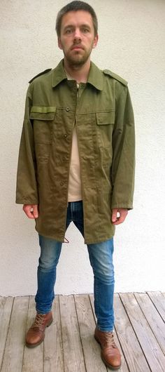 "Military camouflage green jacket, army khaki jacket, olive green coat, field jacket, outdoor jacket, men military uniform, authentic military XL/L Comfortable and good looking outdoor authentic military jacket with zipper closure. Jacket has two chest pockets and two side pockets. There is place to stick your name on chest pocket. Size: seems like women (XL) and men (L) PLEASE CHECK ALL MEASUREMENTS BELLOW Length: 82 cm/ 32\" Shoulder to shoulder: 52 cm/ 21\" Sleeve: 63 cm/ 25\" Chest: 110 cm/ Khaki Military Outerwear With Pockets, Military Style Long Sleeve Khaki Outerwear, Oversized Khaki Utility Jacket With Multiple Pockets, Military Style Khaki Outerwear With Multiple Pockets, Khaki Military Outerwear With Multiple Pockets, Combat Style Khaki Outerwear With Multiple Pockets, Military Style Hunting Outerwear With Multiple Pockets, Combat Style Outerwear With Multiple Pockets For Fall, Khaki Techwear Parka With Pockets