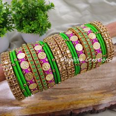 Mayilina Creations provides a perfect bangle with finest finishing, that makes your complete attire unique. Mayilina Creation is your one stop destination for a handmade silk thread bangles for all occasions. We do have perfect return gift bangles for Wedding, Baby Shower, Housewarming, Birthday etc.  You can customize your order (any alterations in colour or number of bangles), please contact seller to satisfy your requirements. Product colour may slightly vary due to photographic lighting sources or your monitor settings. *Material  Plastic/ Metal base bangles, wrapped with fine silk thread and embellished with kundans.  *Use and Purpose Silk thread bangles for wedding functions.  *Dimension Indian Bangle Size (inner diameter in cms) 2.2 - 5.4 cm 2.4 - 5.7 cm 2.6 - 6 cm 2.8 - 6.3 cm *Shi Traditional Silk Thread Jewelry For Diwali, Green Zari Work Bangle Bracelet, Festival Bangle With Dori Work As A Gift, Multicolor Dori Work Bangle For Diwali, Traditional Jewelry With Zari Work On Silk Thread, Traditional Silk Thread Jewelry With Zari Work, Multicolor Silk Thread Jewelry For Wedding, Fusion Style Cutdana Bangle For Festivals, Traditional Multicolor Silk Thread Jewelry