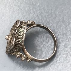 We take pride in finding unique , quality ~ Antique /Vintage jewelry pieces which are carefully hand picked by us so that you can add them to your treasure/ collection or gift to someone you love ~ We try to add plenty of items every week and have been selling online for more then 10 years . Vintage Middle eastern e fine filigree box silver ring featuring with beautiful details Unmarked but acid test positive for silver (atleast 800 silver ) . Measurements : Adjustable Ring size ~Without any adj Antique Vintage Jewelry, Box Ring, Beaded Choker Necklace, Mother Pearl, Silver Filigree, Beaded Choker, Ring Vintage, Adjustable Ring, Ring Box