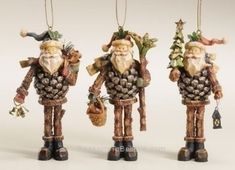 three christmas ornaments hanging from strings in the shape of santa claus and other figures with bells