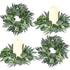 four wreaths with white candles and green leaves