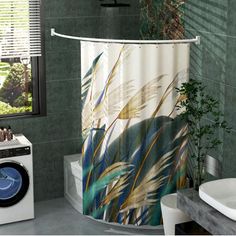 a bathroom with a shower curtain that has plants on it and a washing machine in the corner