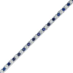 Dainty and dazzling, this tennis bracelet increases the sparkle factor of any attire. Crafted in sterling silver, this simply glistening style showcases alternating 2.0mm lab-created bright blue and shimmering white sapphires. Buffed to a brilliant luster, this 7.25-inch bracelet secures with a box clasp. Sapphire Cubic Zirconia Tennis Bracelet, Sapphire Color Brilliant-cut Cubic Zirconia Bracelets, Classic Sapphire-colored Cubic Zirconia Bracelets, Sapphire Tennis Bracelet Fine Jewelry With Prong Setting, Sapphire Tennis Bracelet With Diamond Accents, Classic Sapphire Tennis Bracelet With Prong Setting, Classic Sapphire Tennis Bracelet For Anniversary, Classic Sapphire Diamond Tennis Bracelet, Blue Cubic Zirconia Tennis Bracelet With Brilliant Cut