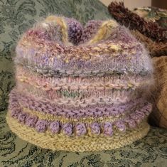 This Is A Brand New Hat, No Tags, I Knit In Premium Silk And Wool Yarn. Colors Are Greens, Plums, Misty Lavender, And Rose. This Is One Of A Kind. No Pets, No Smoking, No Odors. Hand Knitted Purple Hat One Size, Hand Knitted One Size Purple Hats, Hand Knitted Purple Hat, Hand-knitted One Size Purple Hat, Casual Hand Knitted Purple Beanie, Warm Purple Crochet Yarn Hat, Hand Knitted Purple Crochet Hat One Size, Hand Knitted Purple Crochet Hat One Size Fits Most, Hand Knitted One Size Purple Crochet Hat