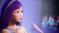 a barbie doll with purple hair holding a microphone