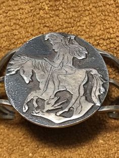 Very Old Hand Carved Silver Cuff Bracelet Depicting Warrior On Horseback | eBay Symbolic Engraved Sterling Silver Cuff Bracelet, Luxury Sterling Silver Engraved Cuff Bracelet, Luxury Engraved Sterling Silver Cuff Bracelet, Artistic Silver Cuff Bracelet, Unique Round Cuff Bracelet With Polished Finish, Antique Silver Sterling Silver Cuff Bracelet, Antique Silver Sterling Silver Cuff Bangle, Engraved Sterling Silver Cuff Bracelet, Artistic Silver Jewelry, Stamped