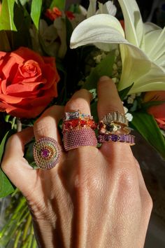 This stunning circle ring features multi-colored pink, orange, and yellow pave cz stones with a unique yellow gold vermeil finish. Colorful Rings Aesthetic, Stacked Rings Aesthetic, Rings Styling, Maximalist Jewelry, Braided Ring Band, Jewel Art, Colored Jewelry, Bath And Body Shop, Crystals Jewelry